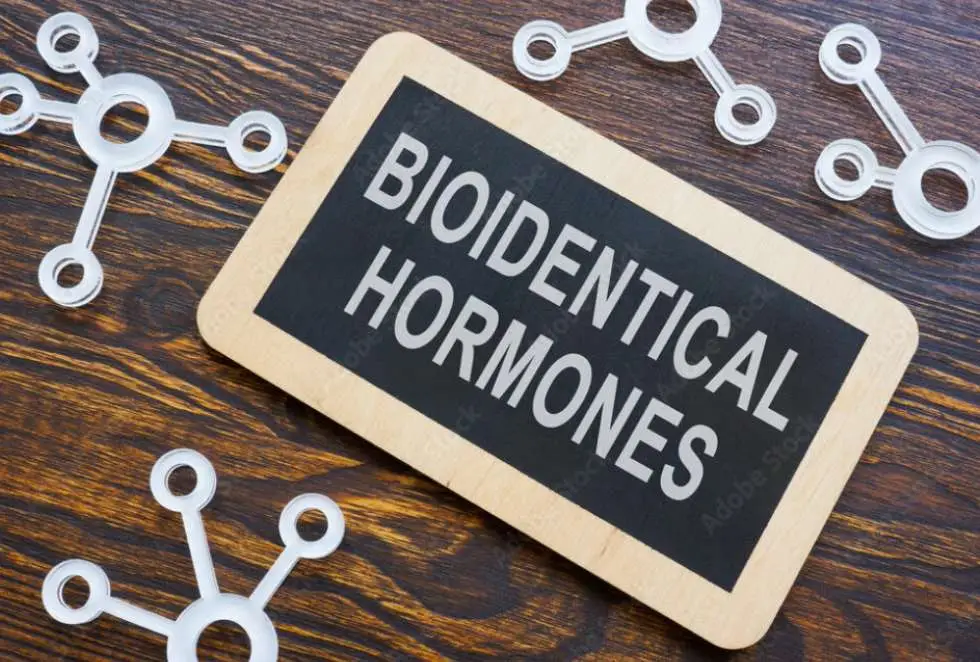 Bioidentical hormones sign with molecule shapes for Health Builders Hormone Management services in Annandale